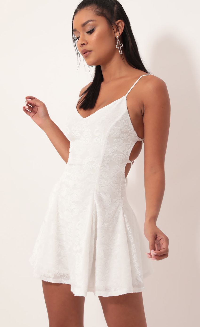 Picture Floral Burnout Velvet A-line Dress In White. Source: https://media-img.lucyinthesky.com/data/Oct19_1/850xAUTO/781A6491.JPG