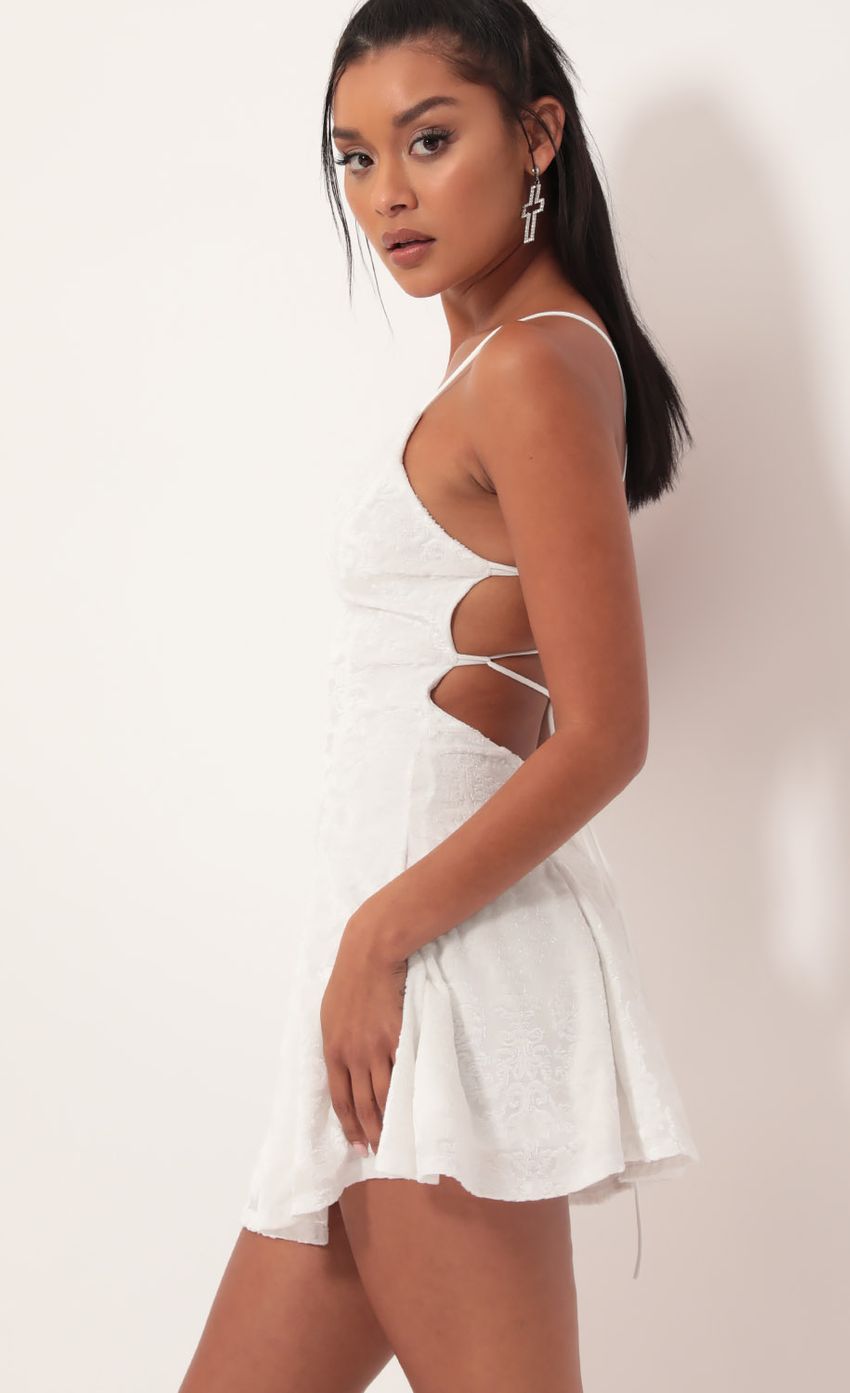 Picture Floral Burnout Velvet A-line Dress In White. Source: https://media-img.lucyinthesky.com/data/Oct19_1/850xAUTO/781A6506.JPG