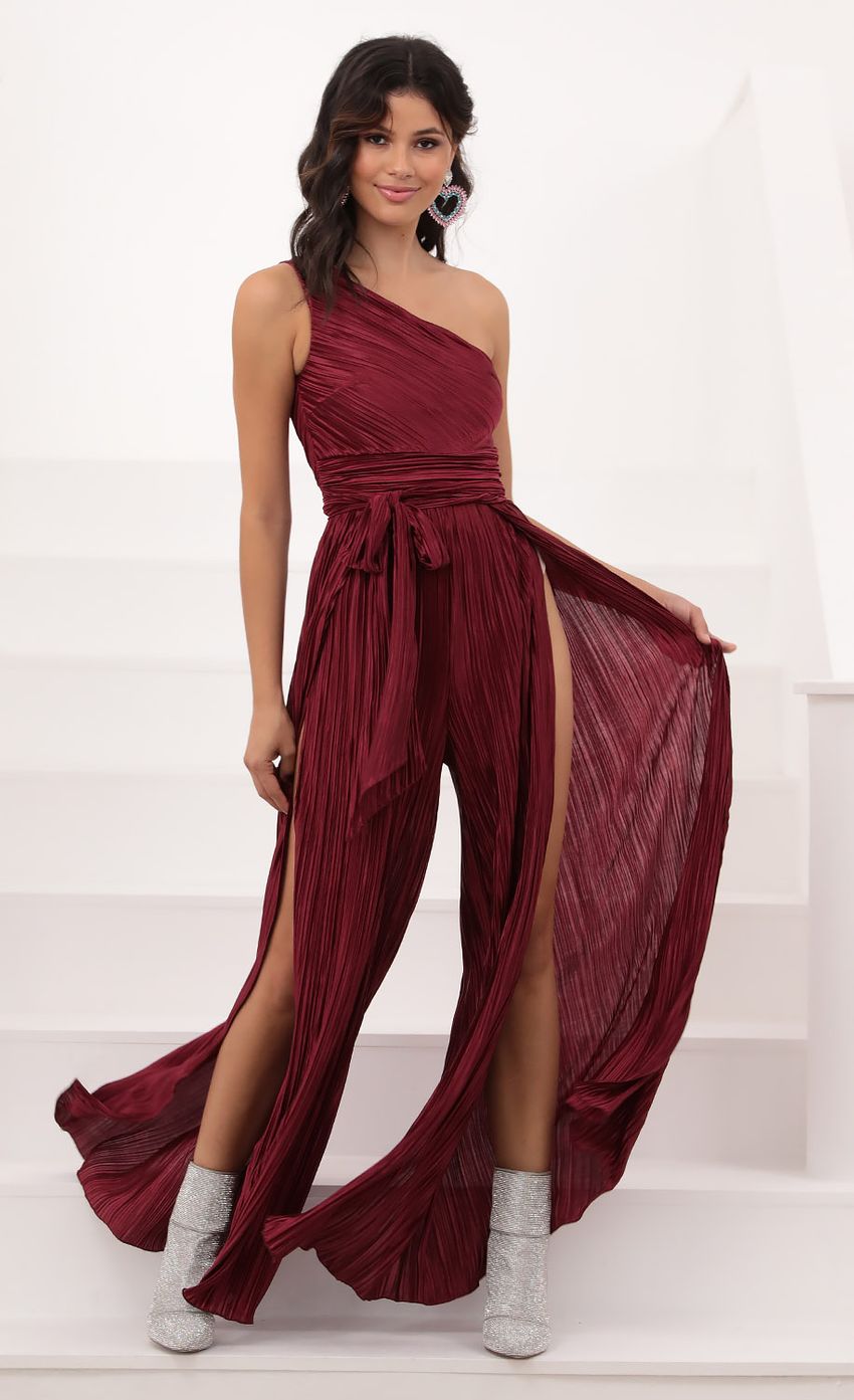 Picture Shimmer One Shoulder Jumpsuit in Burgundy. Source: https://media-img.lucyinthesky.com/data/Oct20_1/850xAUTO/1V9A2089.JPG