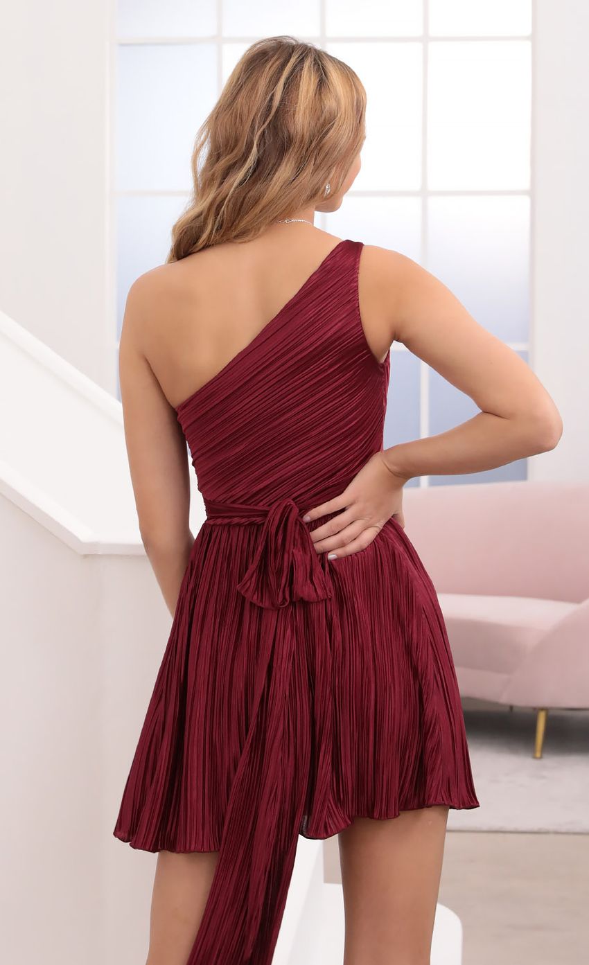 Picture Mary One Shoulder Dress in Burgundy Shimmer. Source: https://media-img.lucyinthesky.com/data/Oct20_1/850xAUTO/781A6192.JPG