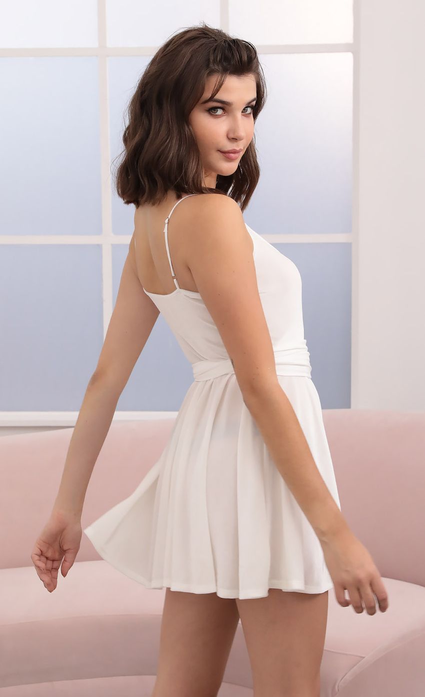 Picture Velvet Wrap Dress in White. Source: https://media-img.lucyinthesky.com/data/Oct20_2/850xAUTO/1V9A2908.JPG