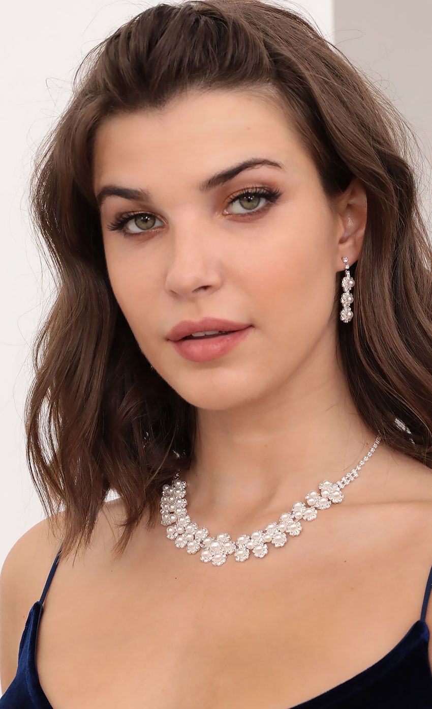 Picture Crystal and Pearl Necklace and Earring Set. Source: https://media-img.lucyinthesky.com/data/Oct20_2/850xAUTO/1V9A4523.JPG