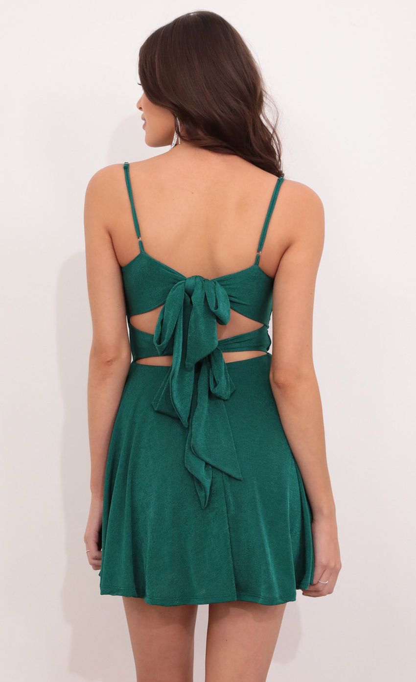Picture Fit and Flare Dress in Emerald Green. Source: https://media-img.lucyinthesky.com/data/Oct21_1/850xAUTO/1V9A05241.JPG
