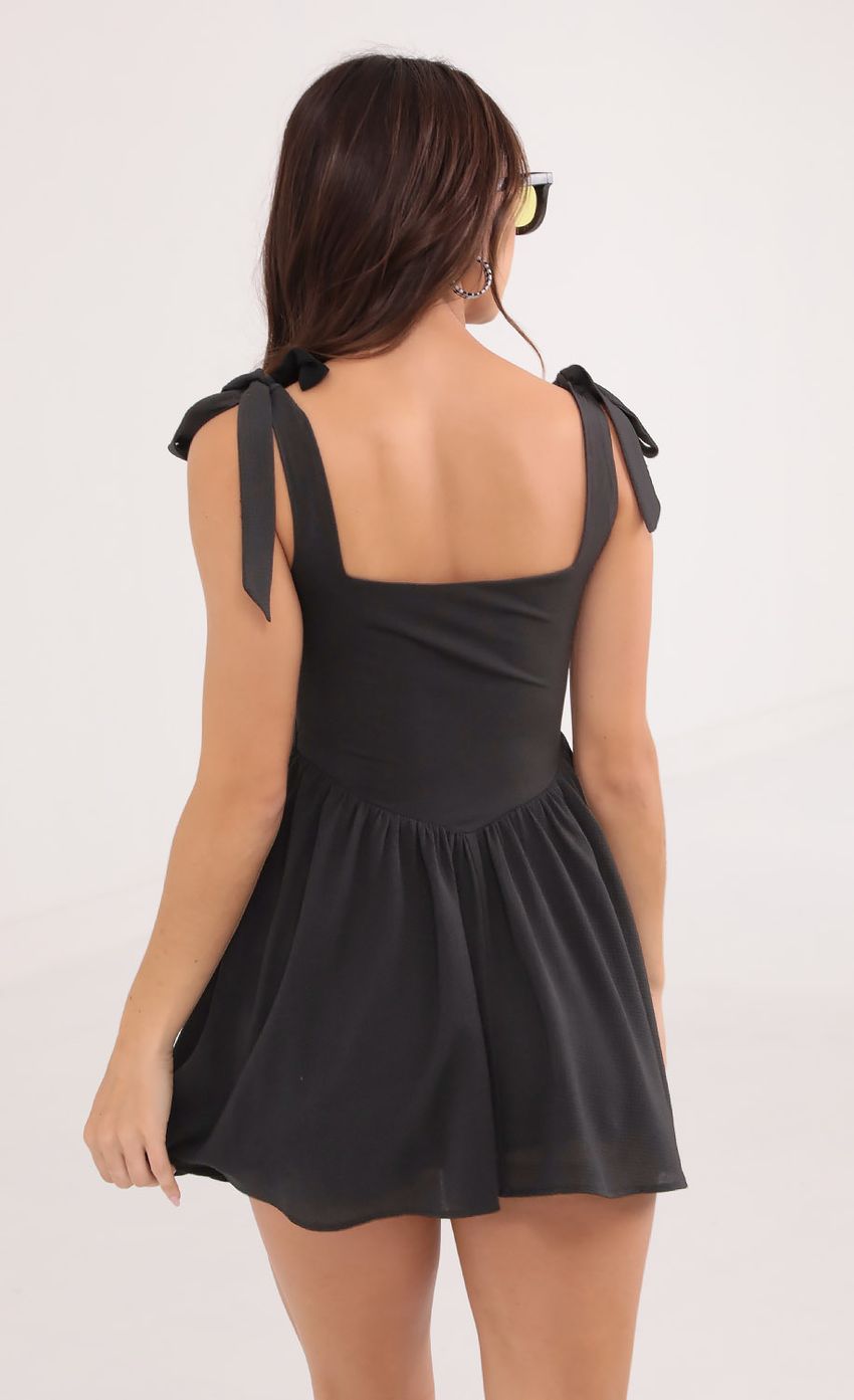 Picture Fit and Flare Dress in Black. Source: https://media-img.lucyinthesky.com/data/Oct21_1/850xAUTO/1V9A7931.JPG