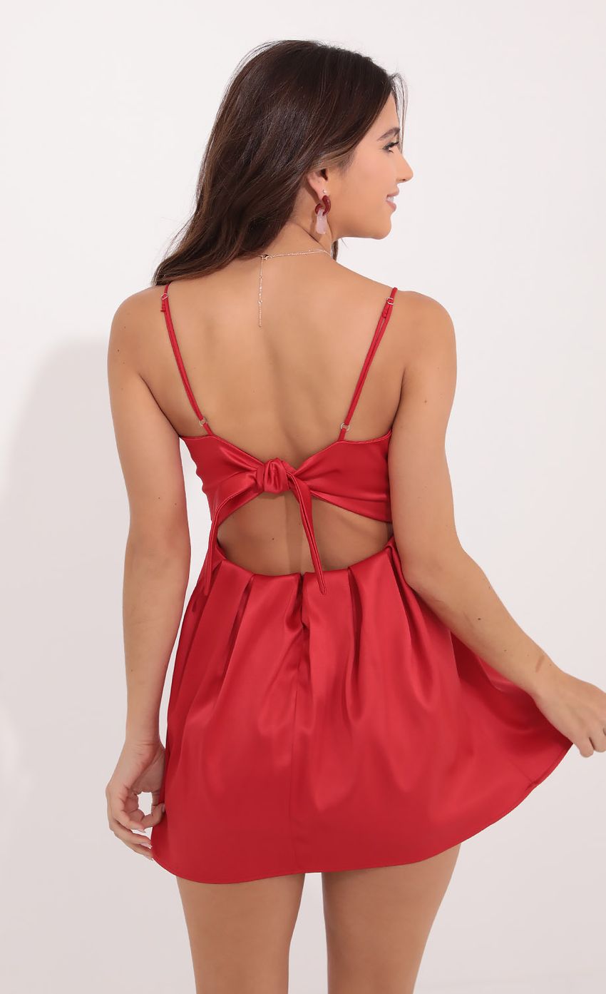 Picture Pleated Dress in Red. Source: https://media-img.lucyinthesky.com/data/Oct21_1/850xAUTO/1V9A8540.JPG