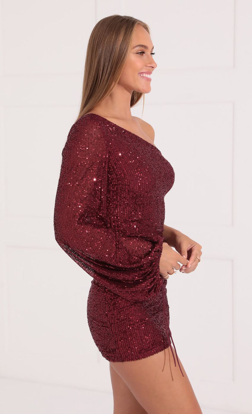 Picture One Shoulder Sequin Dress in Burgundy. Source: https://media-img.lucyinthesky.com/data/Oct21_1/850xAUTO/1V9A8683.JPG