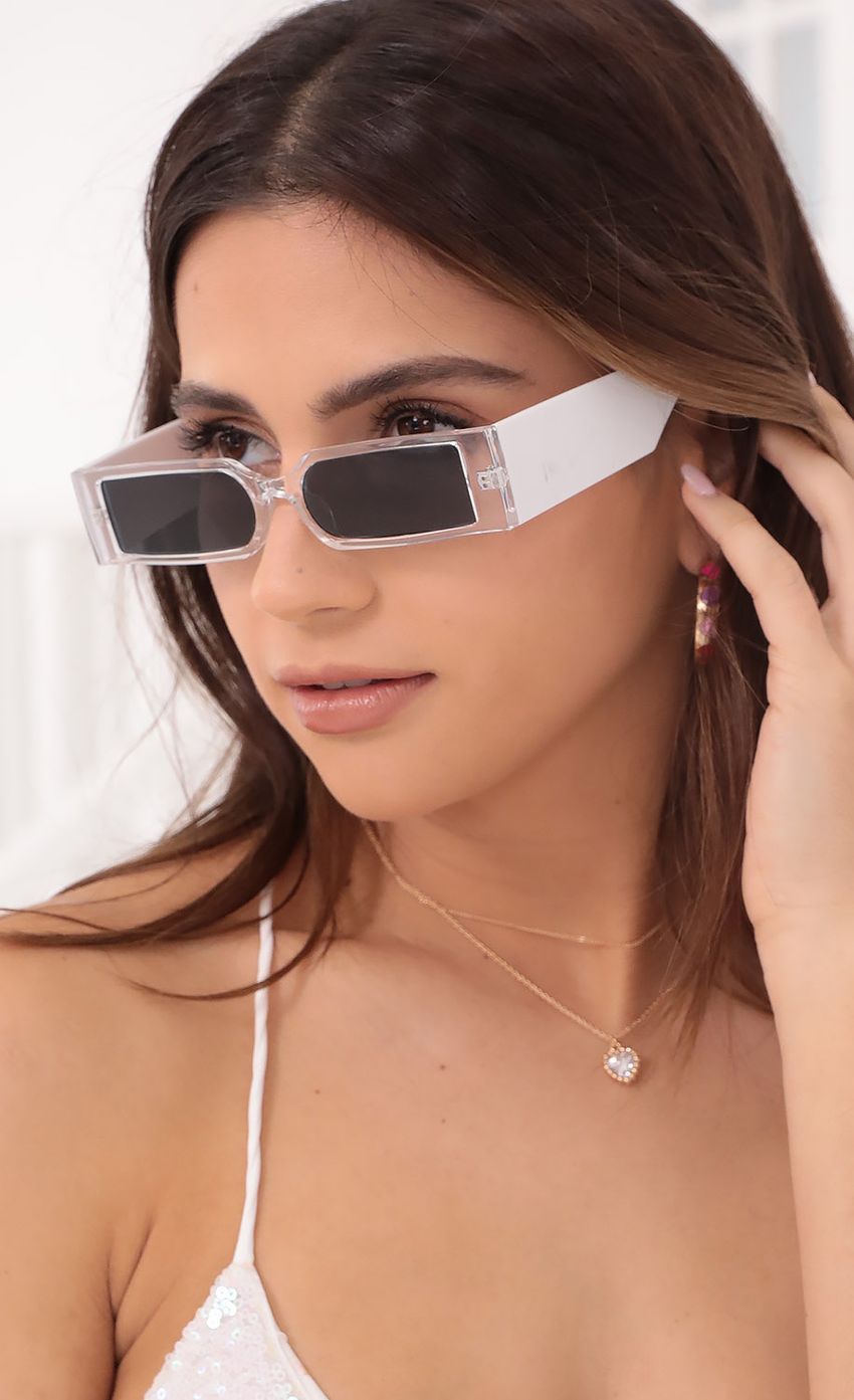 Picture Outer Space Rectangle Sunglasses in White. Source: https://media-img.lucyinthesky.com/data/Oct21_1/850xAUTO/1V9A9702.JPG