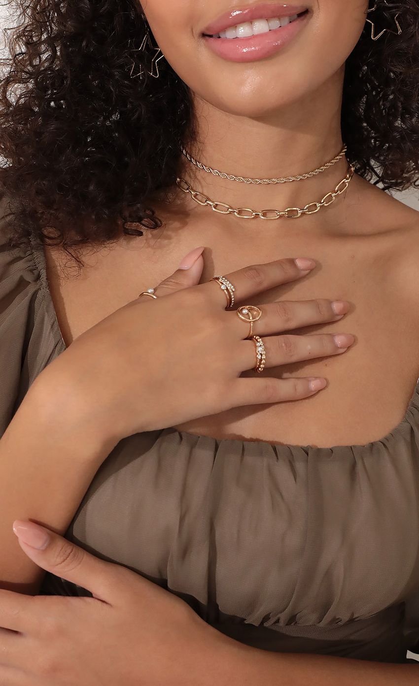 Picture Pearls and Love Ring Set in Gold. Source: https://media-img.lucyinthesky.com/data/Oct21_2/850xAUTO/1V9A0728.JPG