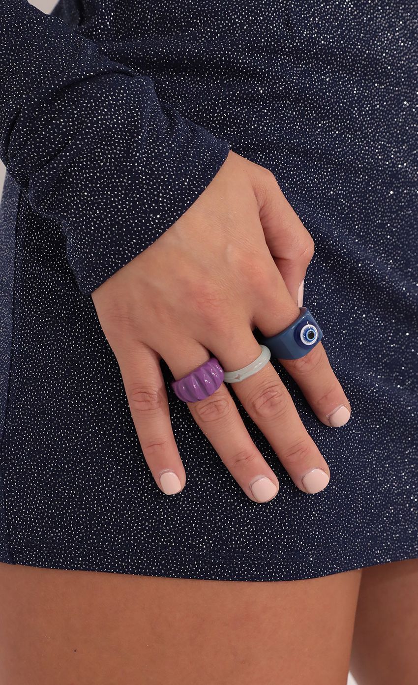 Picture Blue Eyed Baby Resin Ring Set in Blue and Purple. Source: https://media-img.lucyinthesky.com/data/Oct21_2/850xAUTO/1V9A8065.JPG