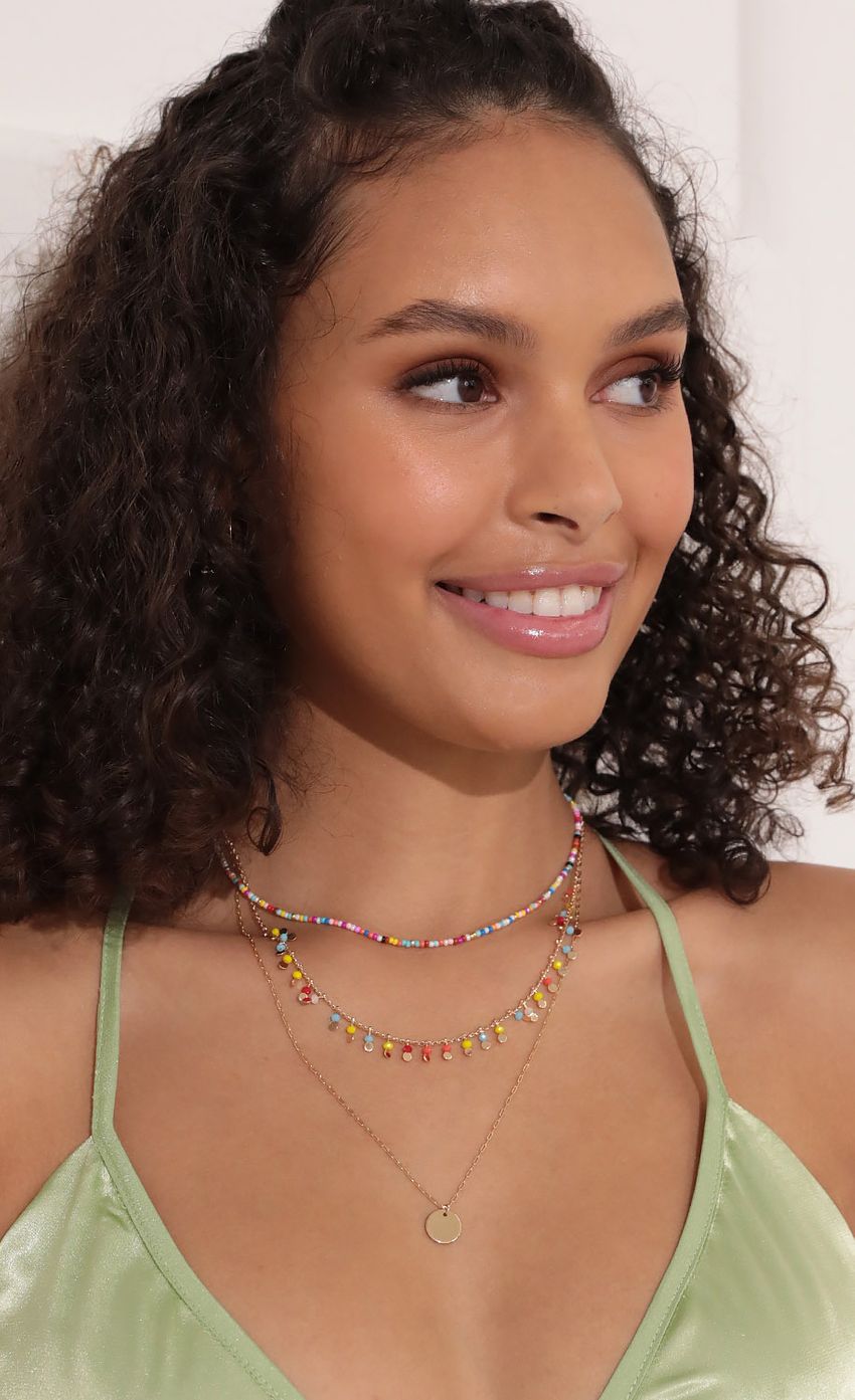 Picture Rainbow Baby Layered Necklace in Multicolor. Source: https://media-img.lucyinthesky.com/data/Oct21_2/850xAUTO/2V9A0434.JPG