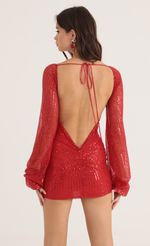 Picture Sequin Open Back Long Sleeve Dress in Red. Source: https://media-img.lucyinthesky.com/data/Oct22/150xAUTO/259024cb-7e8d-4991-b3cd-f8e3a45f3ebe.jpg