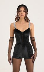 Picture Silver Sequin Hook and Eye Romper in Black. Source: https://media-img.lucyinthesky.com/data/Oct22/150xAUTO/f66d5ffd-8bcf-4111-a2b0-286a39ce7b16.jpg