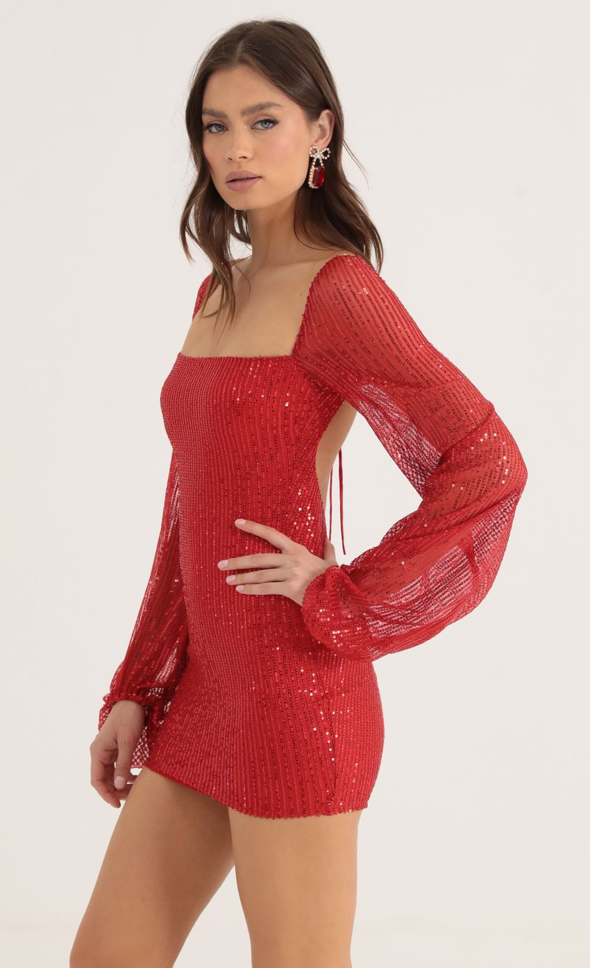 Picture Sequin Open Back Long Sleeve Dress in Red. Source: https://media-img.lucyinthesky.com/data/Oct22/850xAUTO/108b839f-1356-4c01-ac57-7e5edf22a77a.jpg