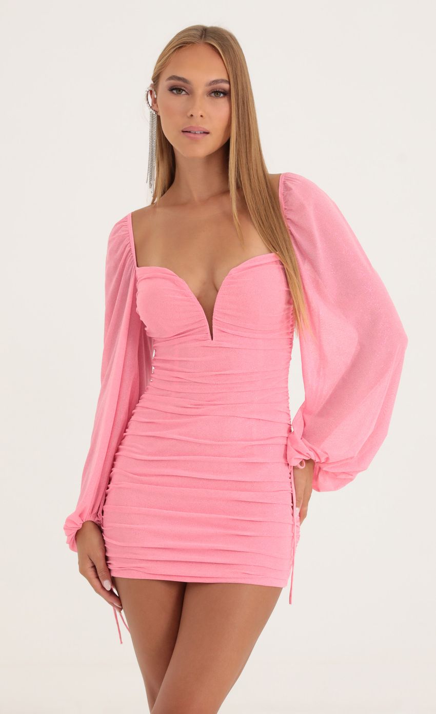 Picture Glitter Deep V Shimmer Dress in Pink. Source: https://media-img.lucyinthesky.com/data/Oct22/850xAUTO/225e3e67-18eb-4e60-b2ee-409456372165.jpg