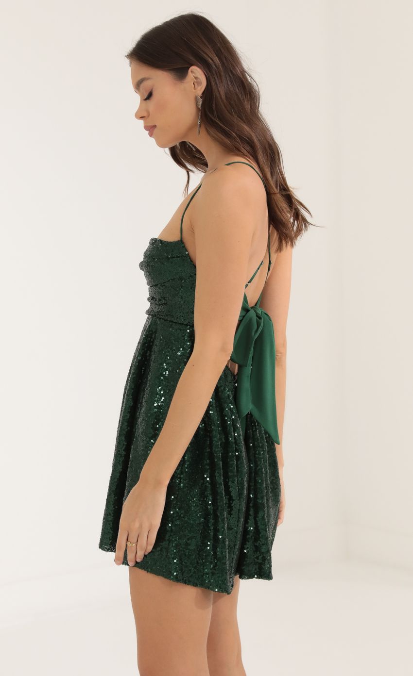 Picture Sequin A-Line Dress in Green. Source: https://media-img.lucyinthesky.com/data/Oct22/850xAUTO/318f857e-e9f6-4320-afc4-cd7cca52e0a5.jpg
