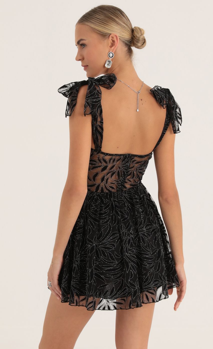 Picture Jacqueline Glitter Mesh Print Dress in Black. Source: https://media-img.lucyinthesky.com/data/Oct22/850xAUTO/334fd79a-9d21-45e2-9c4a-51c1623e34de.jpg