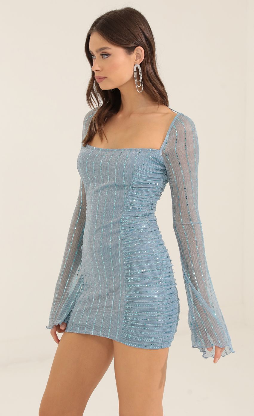 Picture Metallic Sequin Ruched Bodycon Dress in Blue. Source: https://media-img.lucyinthesky.com/data/Oct22/850xAUTO/33739c60-eae9-4a17-af98-a4eda4defc49.jpg