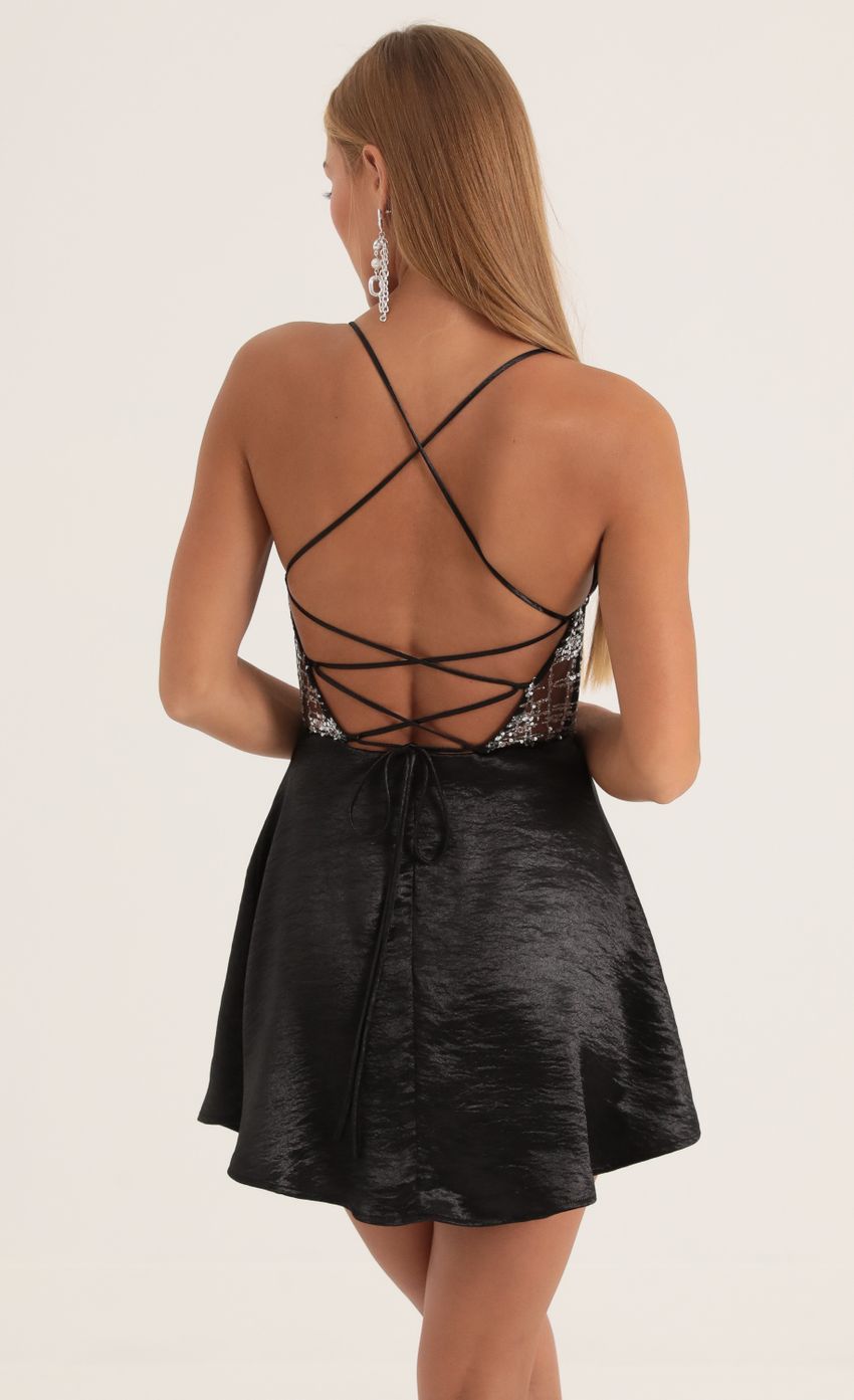 Picture Satin Cutout Dress in Black. Source: https://media-img.lucyinthesky.com/data/Oct22/850xAUTO/3767e7bc-30dd-45e7-ad18-f7afd08619b2.jpg