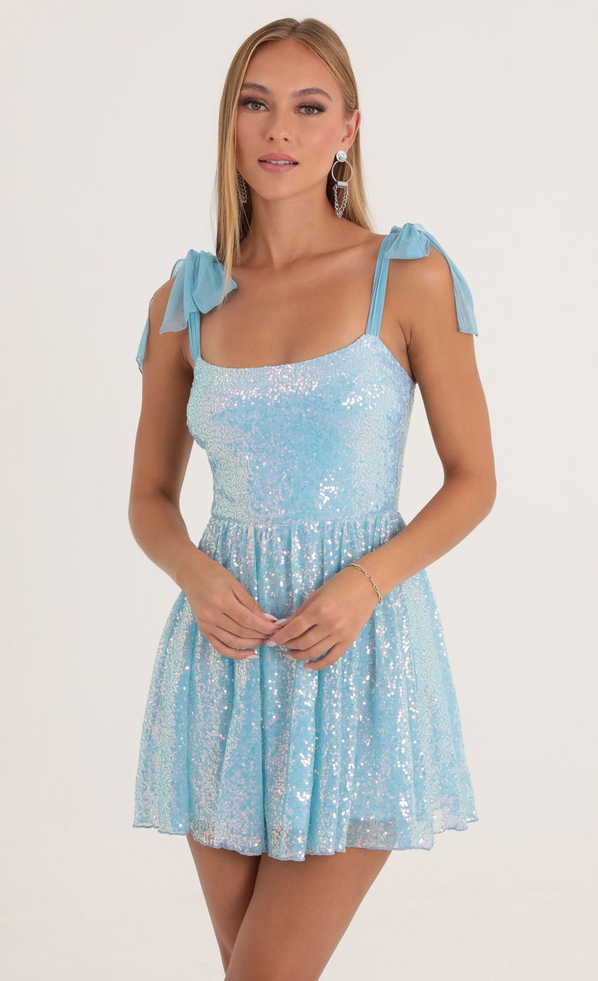 Picture Jacqueline Iridescent Sequin Dress in Blue. Source: https://media-img.lucyinthesky.com/data/Oct22/850xAUTO/38a7a4a7-5489-40b1-915f-7fe4fe910571.jpg