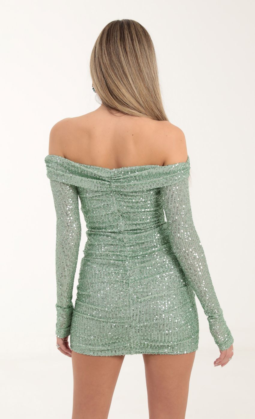 Picture Sequin Mesh Off The Shoulder Dress in Green. Source: https://media-img.lucyinthesky.com/data/Oct22/850xAUTO/4738e142-ed30-43e1-afb3-be03eb8f7790.jpg