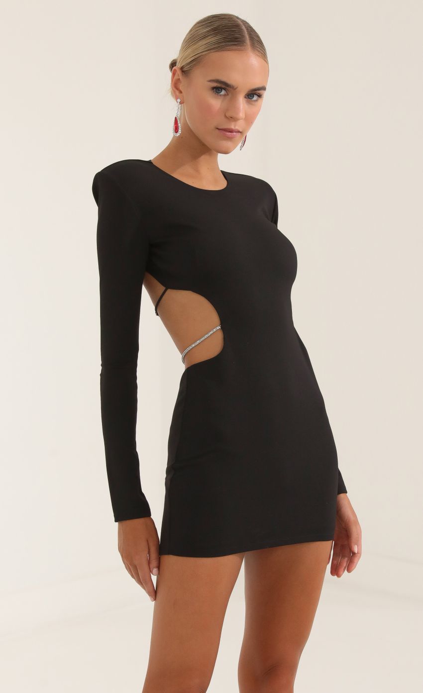 Picture Crepe Shoulder Pad Cutout Dress in Black. Source: https://media-img.lucyinthesky.com/data/Oct22/850xAUTO/4e2fd3e5-7abe-4046-953f-c798b0ccfd9b.jpg
