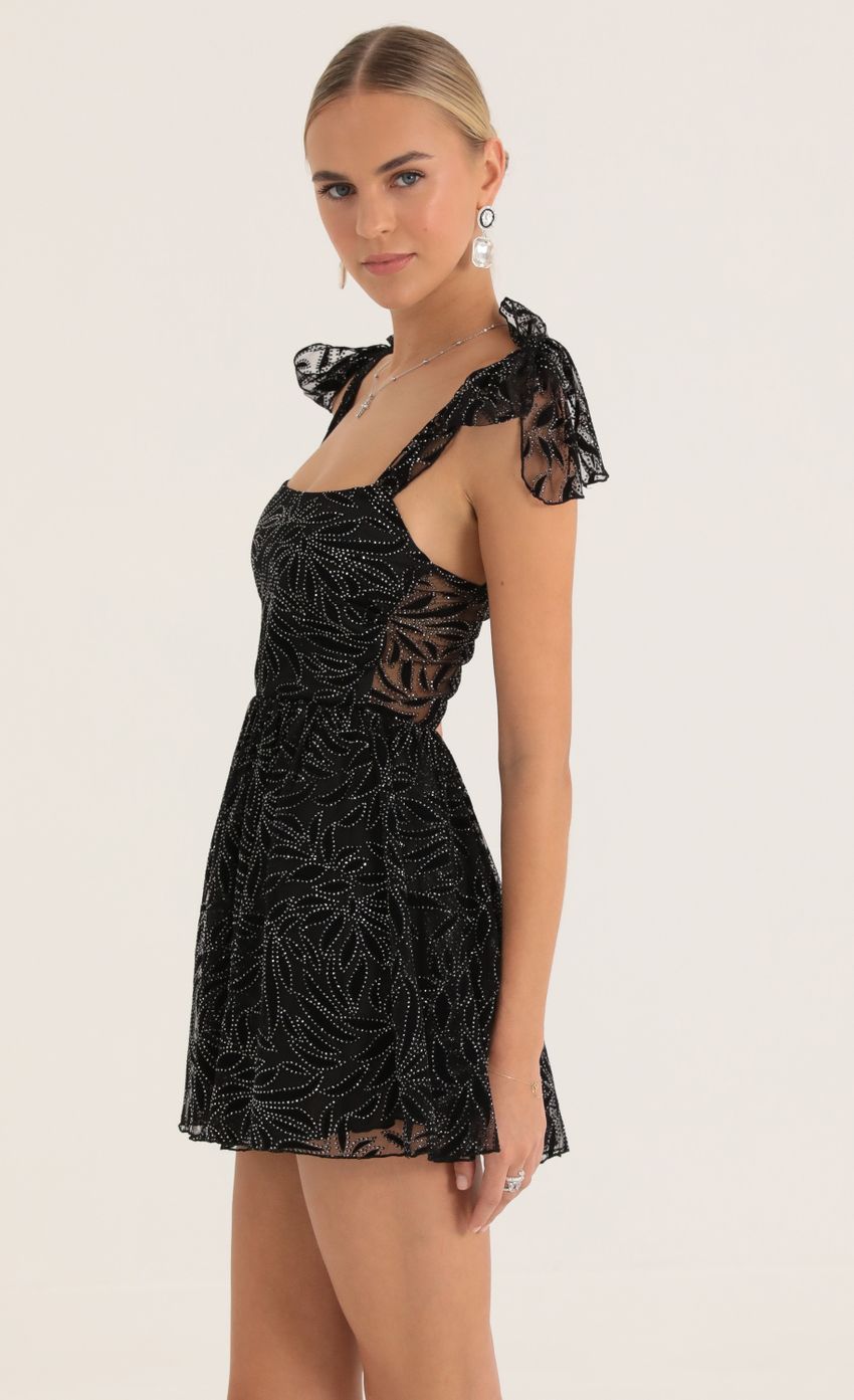 Picture Jacqueline Glitter Mesh Print Dress in Black. Source: https://media-img.lucyinthesky.com/data/Oct22/850xAUTO/4e9709ab-67fd-4c1d-a734-920c4c2dd948.jpg