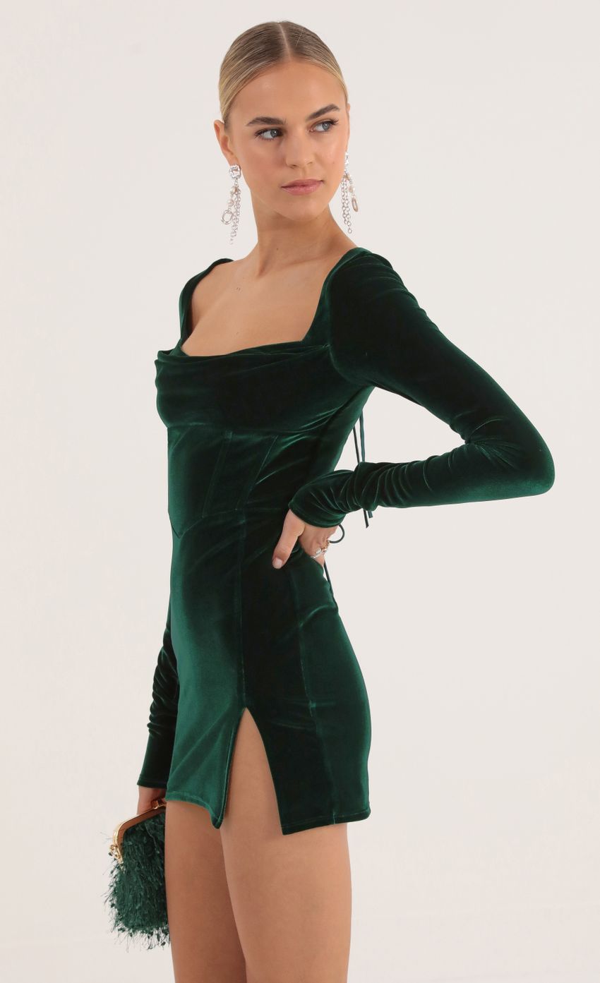 Picture Velvet Long Sleeve Corset Dress in Green. Source: https://media-img.lucyinthesky.com/data/Oct22/850xAUTO/5793d728-e780-4b0d-9205-9d6a130b49b3.jpg