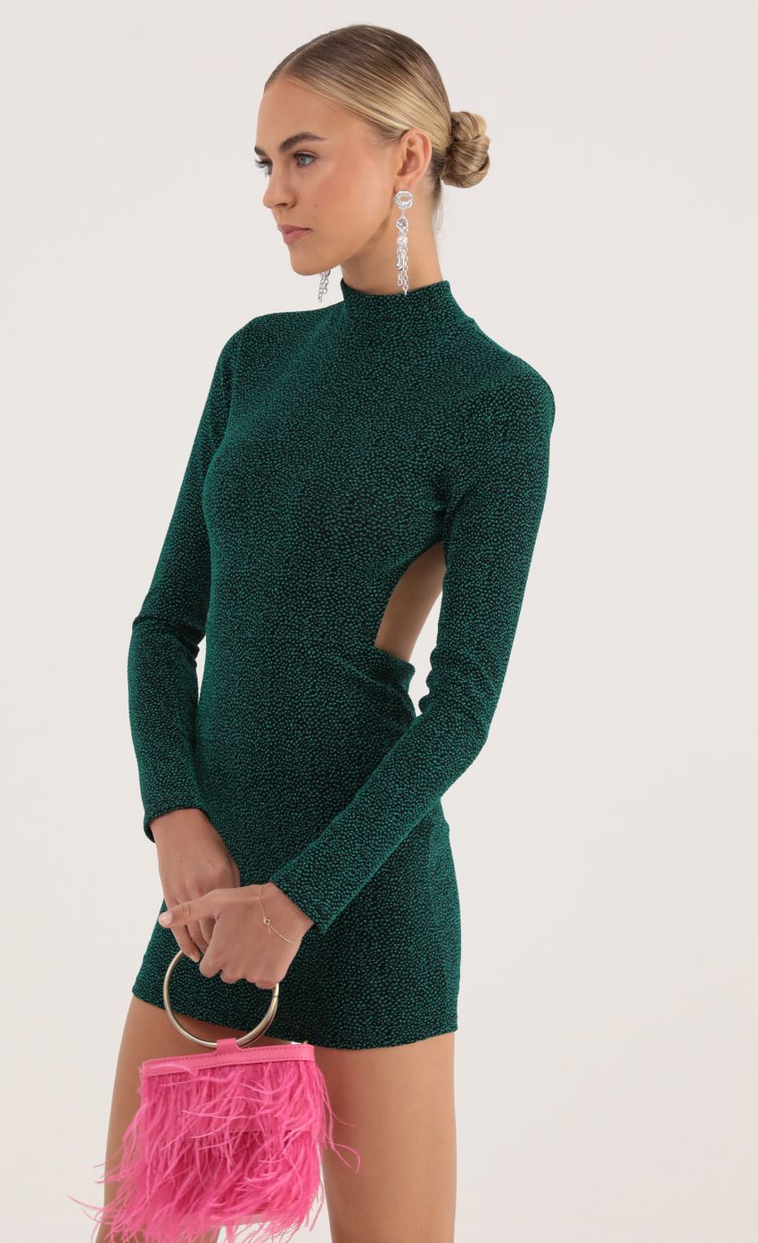 Picture Dotted Knit Open Back Dress in Green. Source: https://media-img.lucyinthesky.com/data/Oct22/850xAUTO/618ff29f-6429-40a5-8747-47c9a7a308a9.jpg