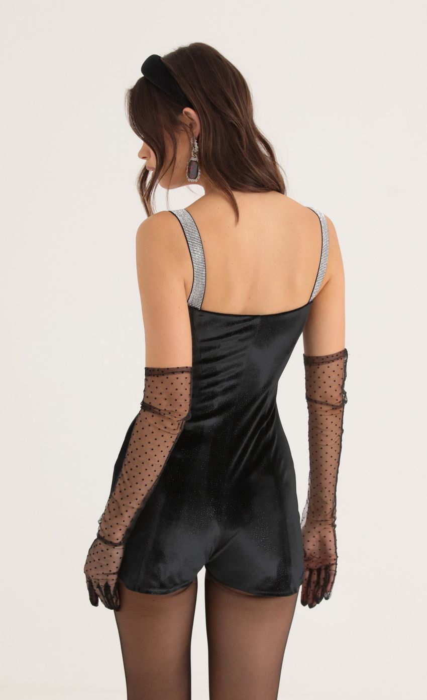 Picture Velvet Shimmer Hook and Eye Romper in Black. Source: https://media-img.lucyinthesky.com/data/Oct22/850xAUTO/6fae2a6d-a94d-4ce7-acb8-9931ce22d4f0.jpg