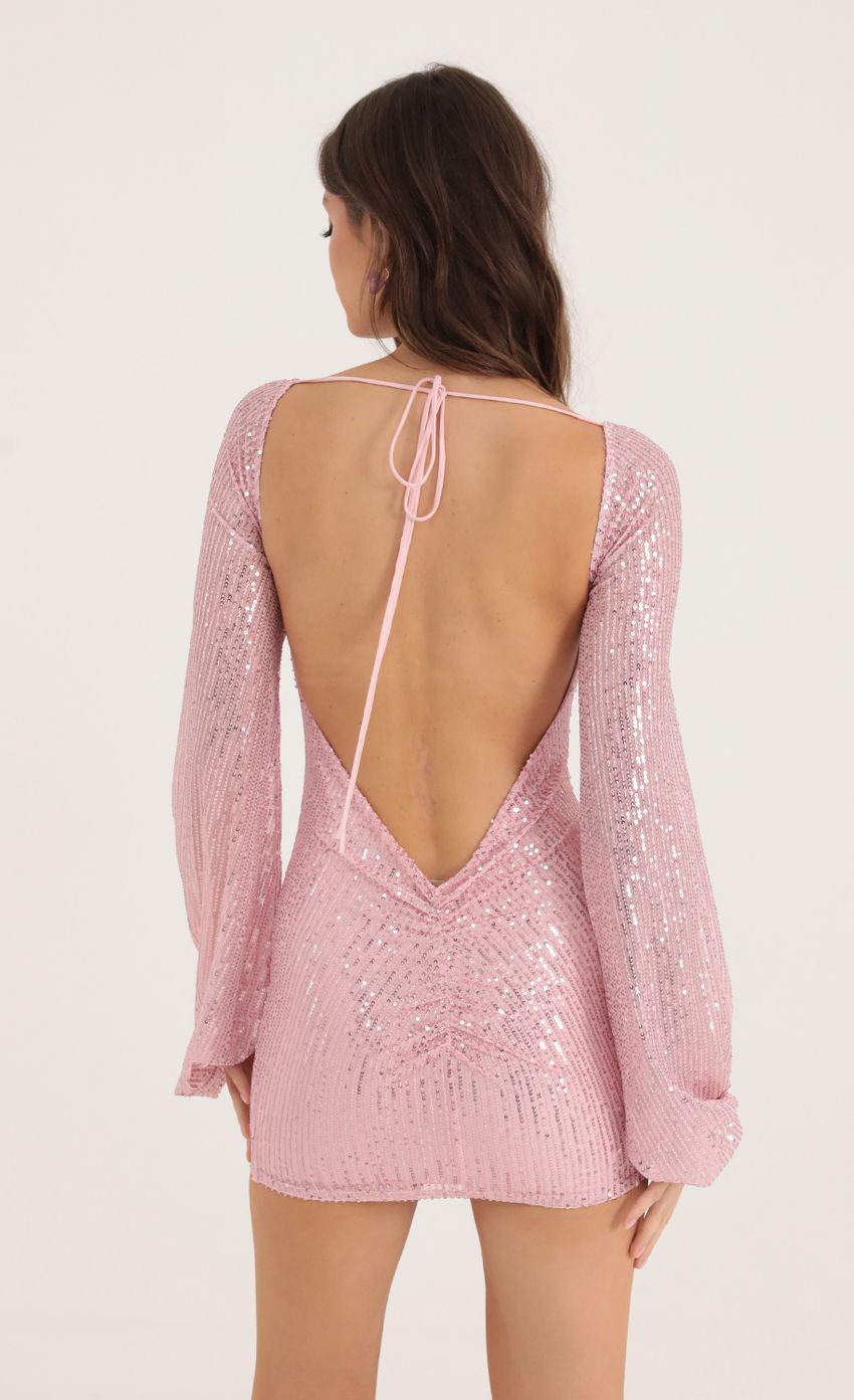 Picture Sequin Open Back Long Sleeve Dress in Pink. Source: https://media-img.lucyinthesky.com/data/Oct22/850xAUTO/7ed0e0dd-8871-4050-9c66-6a51e67f3f40.jpg