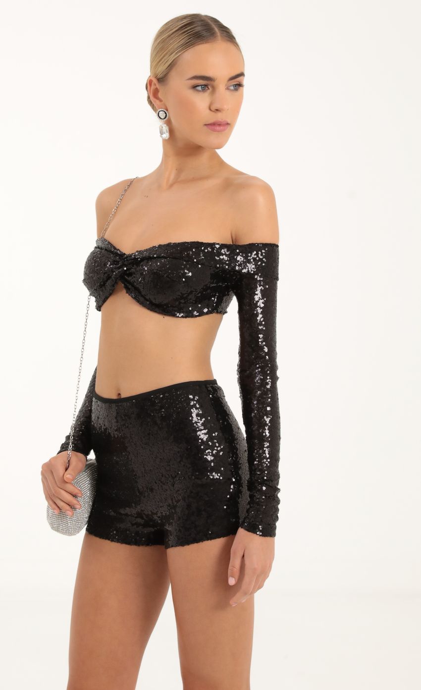 Picture Sequin Two Piece Set in Black. Source: https://media-img.lucyinthesky.com/data/Oct22/850xAUTO/8c5c0aca-a069-41cd-8e35-16333088fd09.jpg