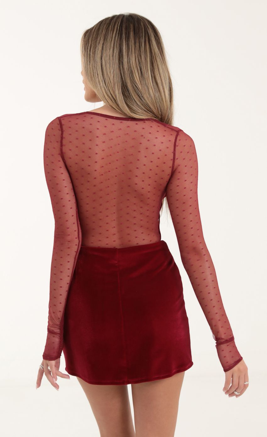 Picture Dotted Mesh Long Sleeve Cutout Dress in Red. Source: https://media-img.lucyinthesky.com/data/Oct22/850xAUTO/91aa45a3-6721-47ae-a489-41212d48b609.jpg