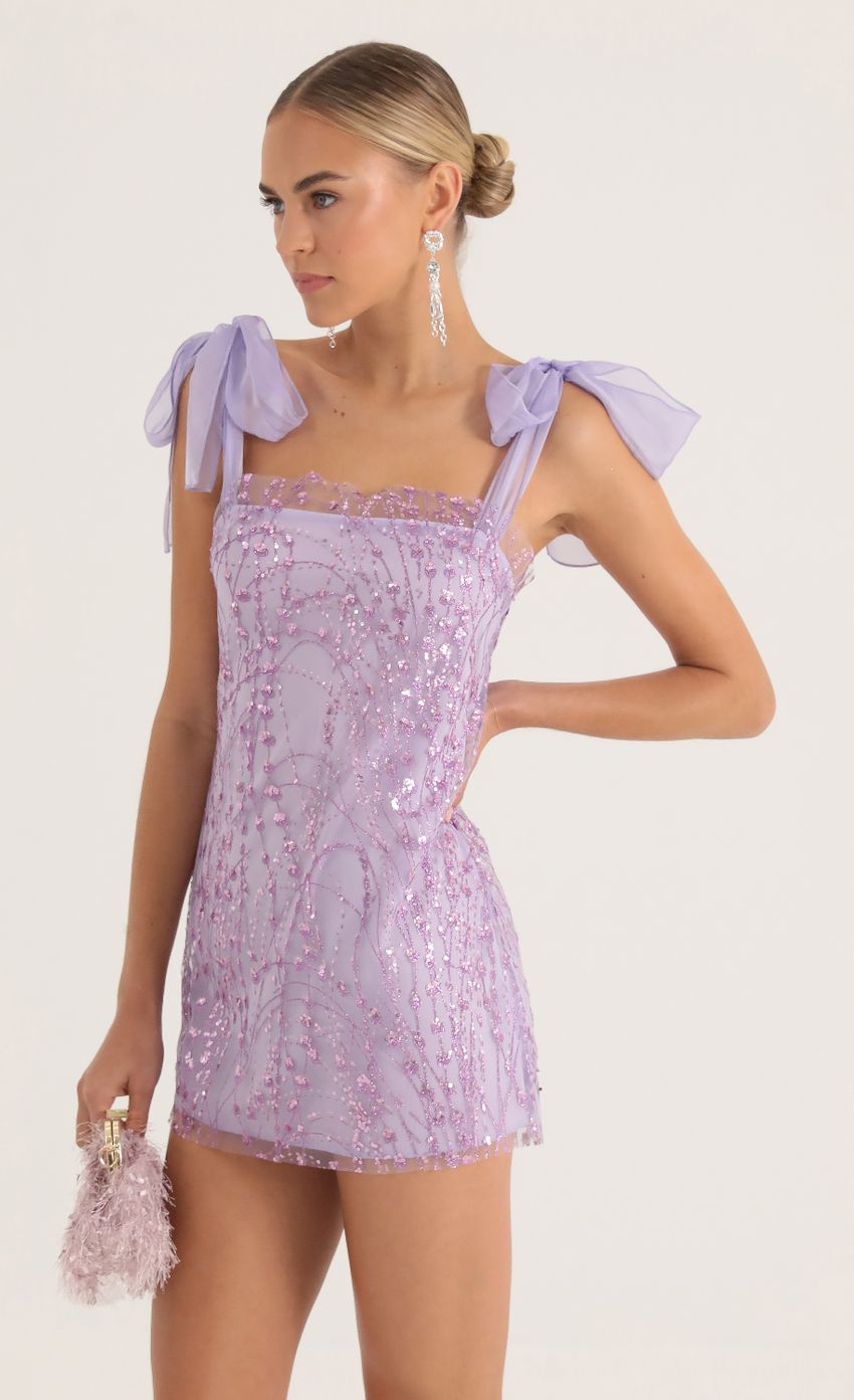 Picture Tulle Sequin Mini Dress in Purple. Source: https://media-img.lucyinthesky.com/data/Oct22/850xAUTO/92292df3-c0ce-47c1-8f20-4f60eaf9dda5.jpg