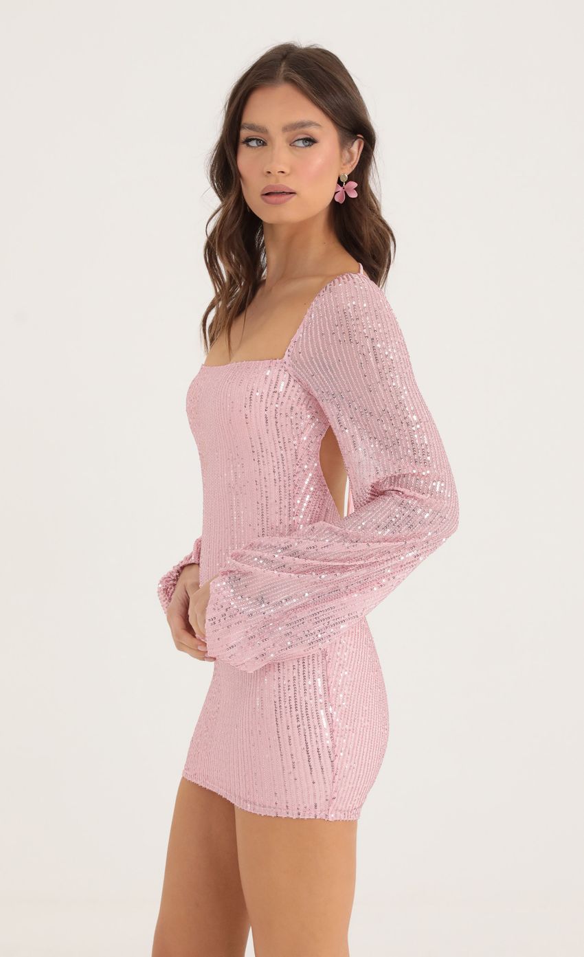 Picture Sequin Open Back Long Sleeve Dress in Pink. Source: https://media-img.lucyinthesky.com/data/Oct22/850xAUTO/9bb35b28-cc48-46f4-a40b-9155ea6d4d55.jpg