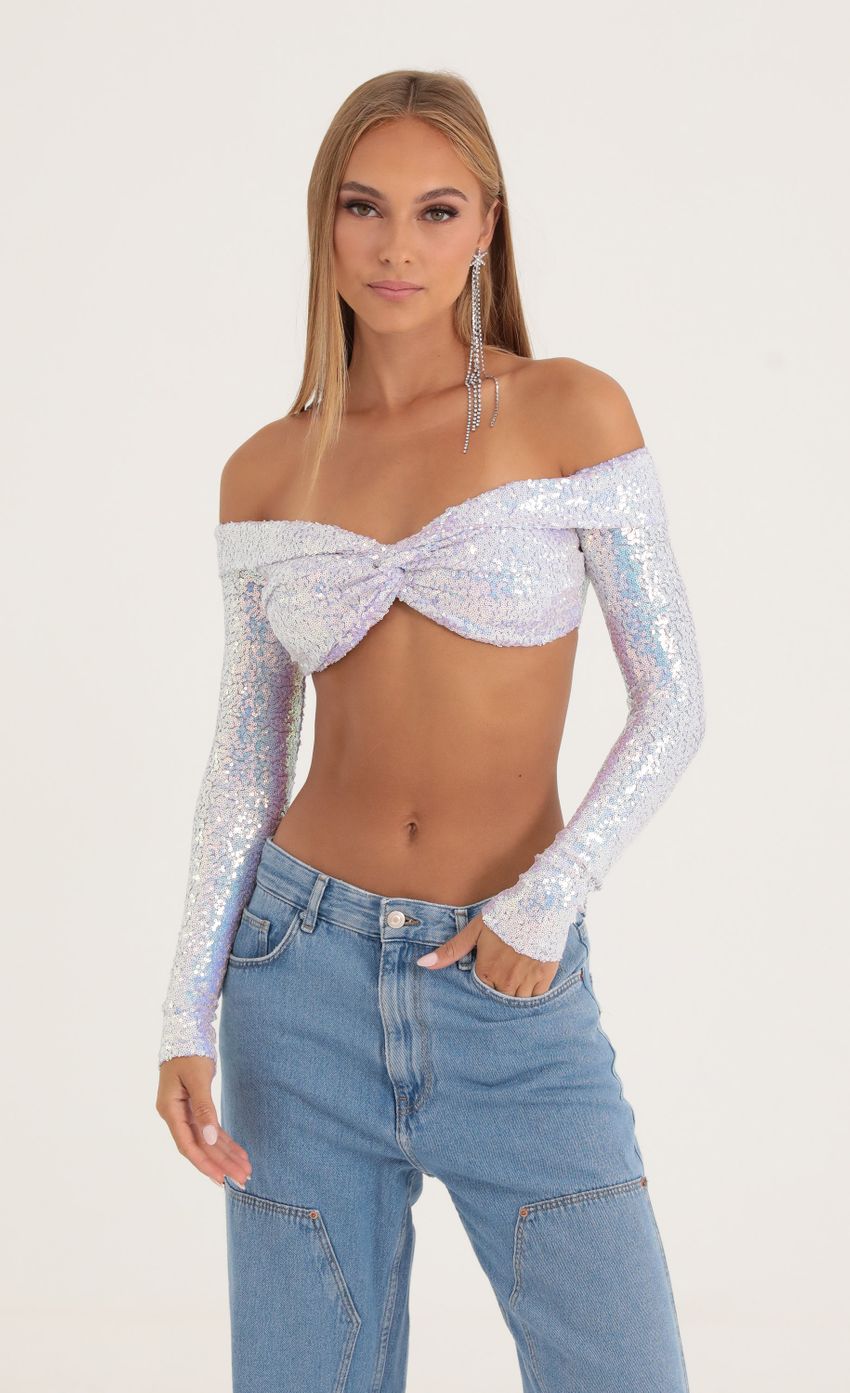 Picture Iridescent Sequin Off The Shoulder Top in Purple. Source: https://media-img.lucyinthesky.com/data/Oct22/850xAUTO/9e49859d-c15e-4055-8f5b-dd36944fd7b1.jpg