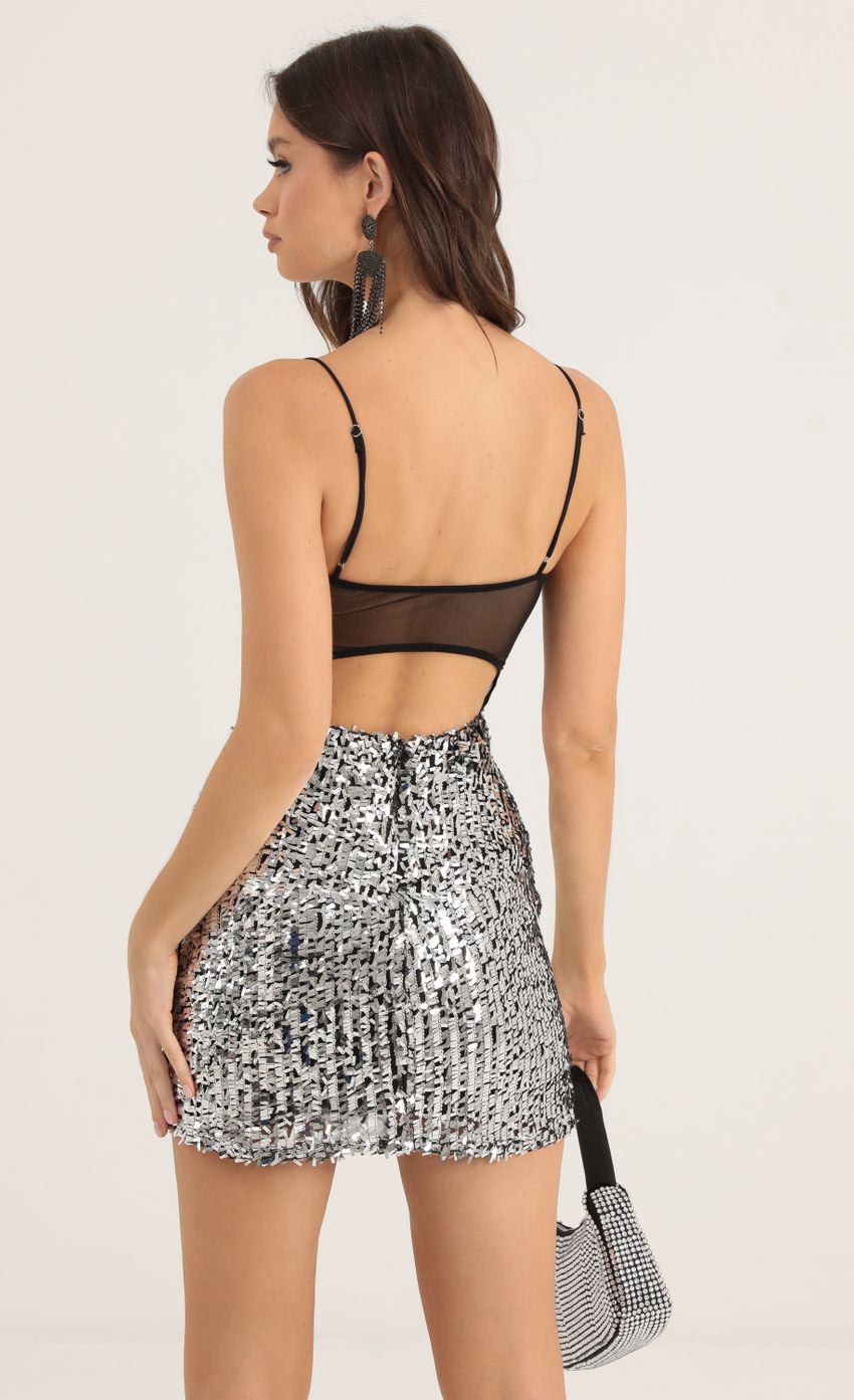 Picture Mesh Sequin Open Back Bodycon Dress in Silver. Source: https://media-img.lucyinthesky.com/data/Oct22/850xAUTO/9f0a20de-b3ed-430c-878d-588be98dd720.jpg