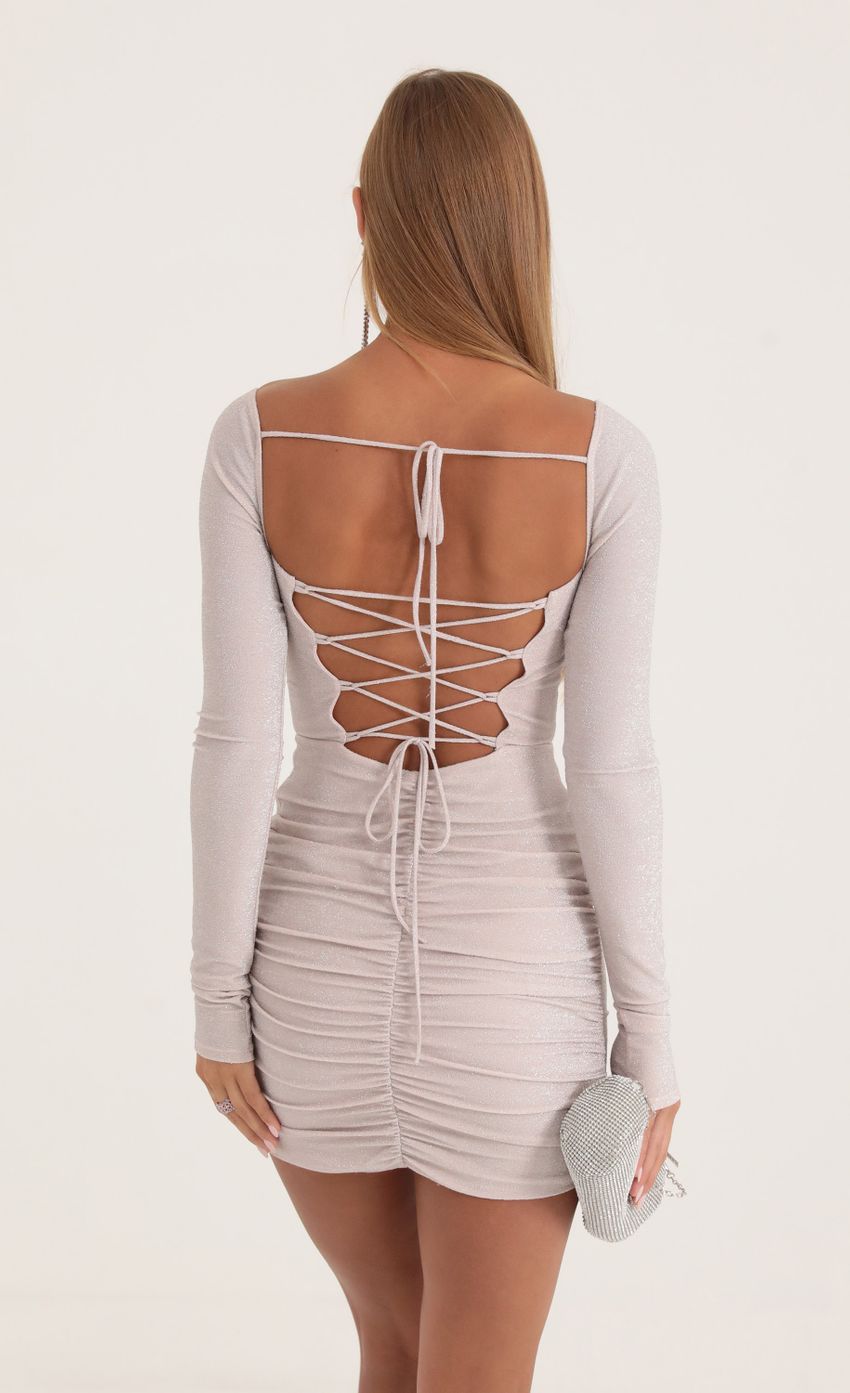 Picture Theia Metallic Knit Corset Dress in Dusty Rose. Source: https://media-img.lucyinthesky.com/data/Oct22/850xAUTO/dcaffc17-d6e5-46b1-83b2-ed6bef377fab.jpg