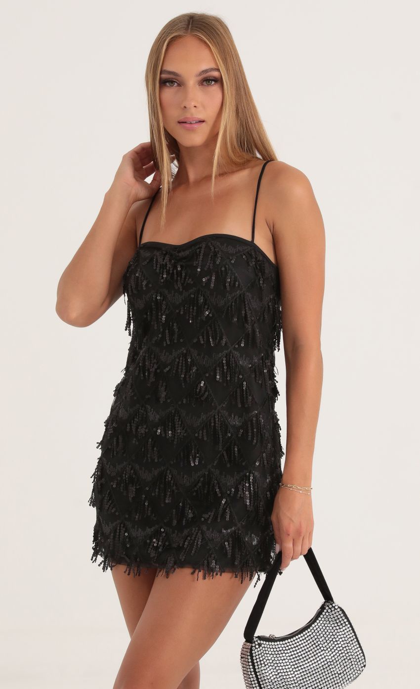 Picture Tulle Sequin Fringe Dress in Black. Source: https://media-img.lucyinthesky.com/data/Oct22/850xAUTO/dde5304c-740c-4c73-bd00-a7fee14db82d.jpg