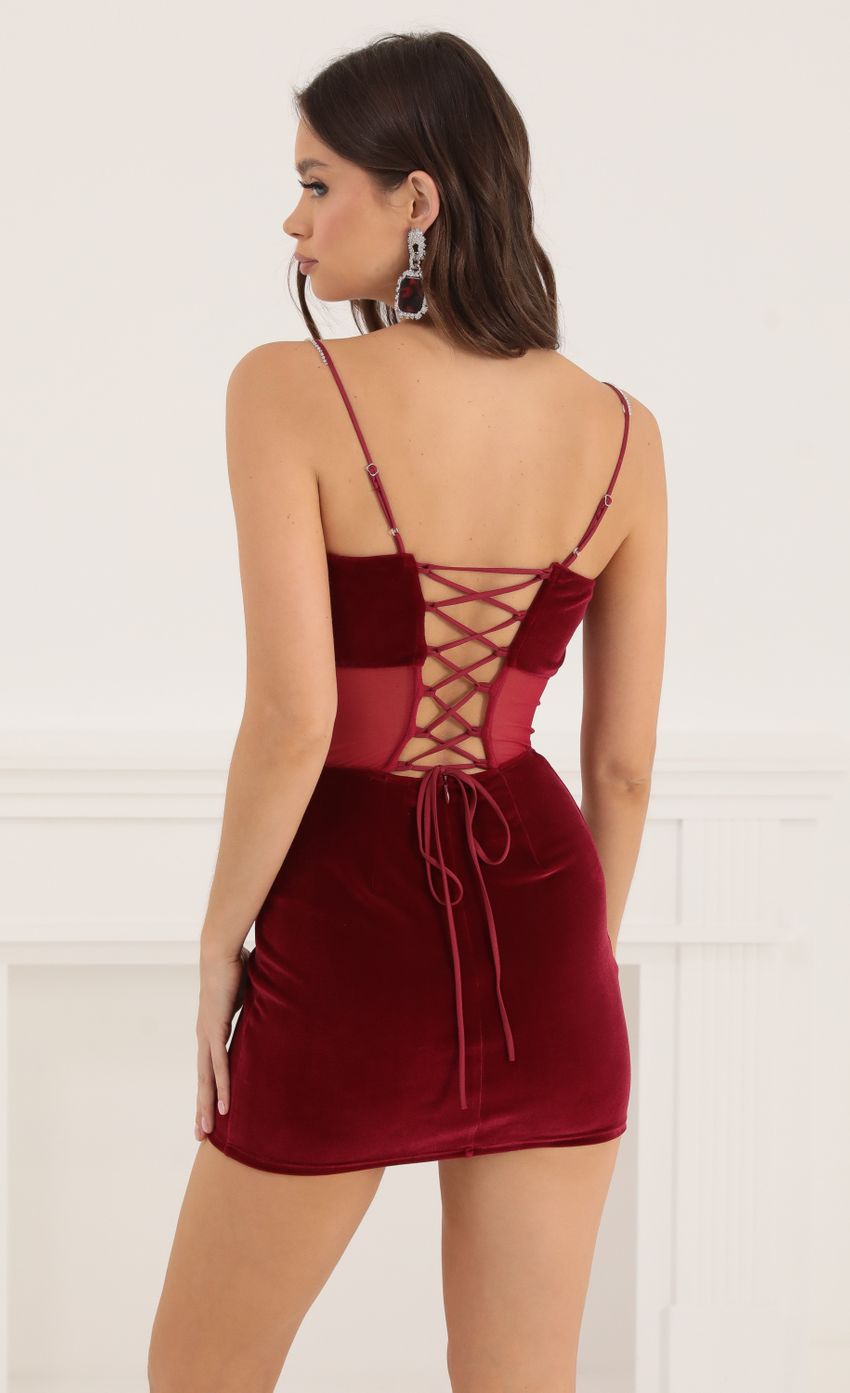 Picture Velvet Rhinestone Corset Dress in Red. Source: https://media-img.lucyinthesky.com/data/Oct22/850xAUTO/dfdefdf7-77ea-4449-a348-aa5f9c384336.jpg