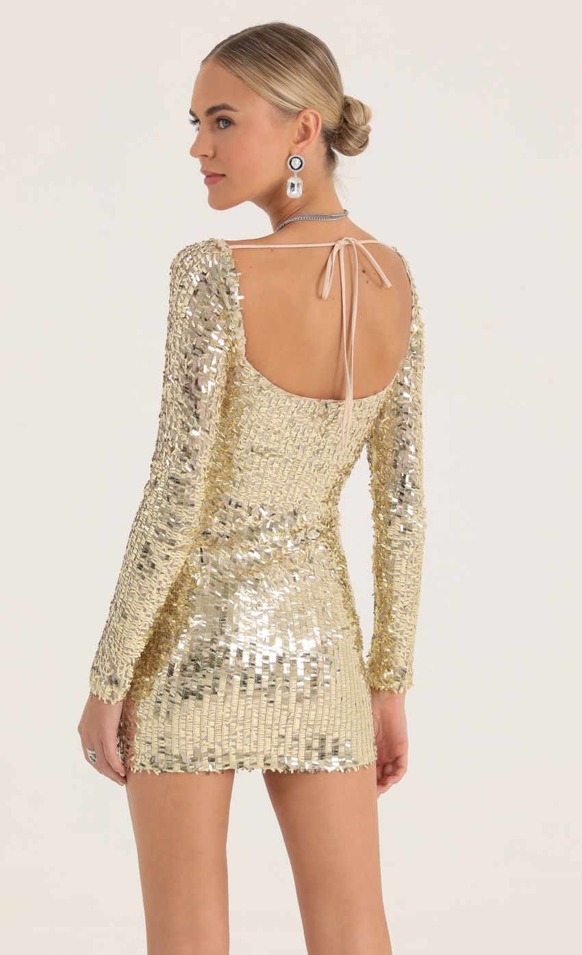 Picture Sequin Mesh Dress in Gold. Source: https://media-img.lucyinthesky.com/data/Oct22/850xAUTO/e8ddec57-96e1-4558-8eac-c19ae7cb2e20.jpg