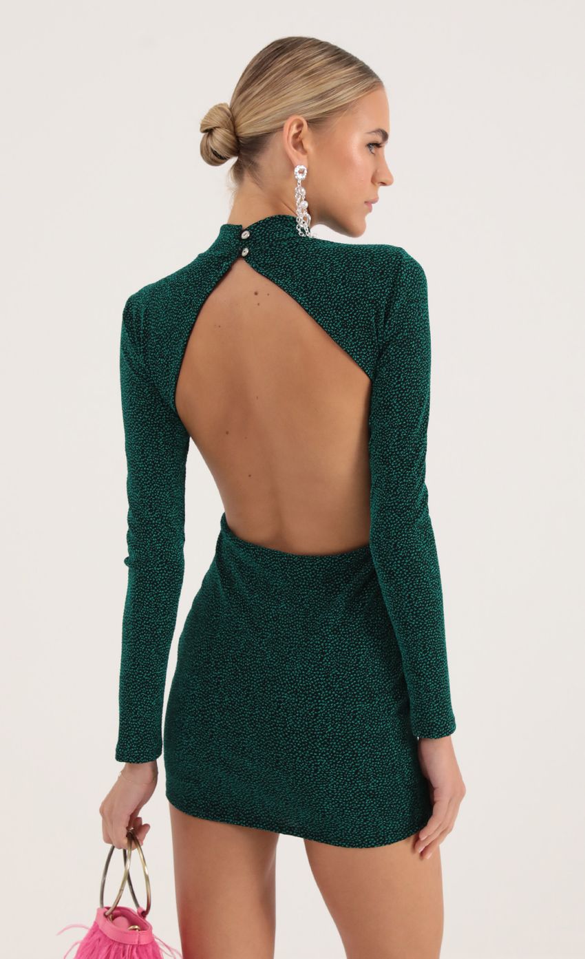 Picture Dotted Knit Open Back Dress in Green. Source: https://media-img.lucyinthesky.com/data/Oct22/850xAUTO/ee611a31-4e67-43a4-b4c0-3a6d3562593f.jpg