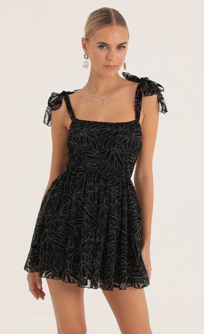 Picture Jacqueline Glitter Mesh Print Dress in Black. Source: https://media-img.lucyinthesky.com/data/Oct22/850xAUTO/f322918e-87f2-4048-a7a0-d2e9d1bee110.jpg