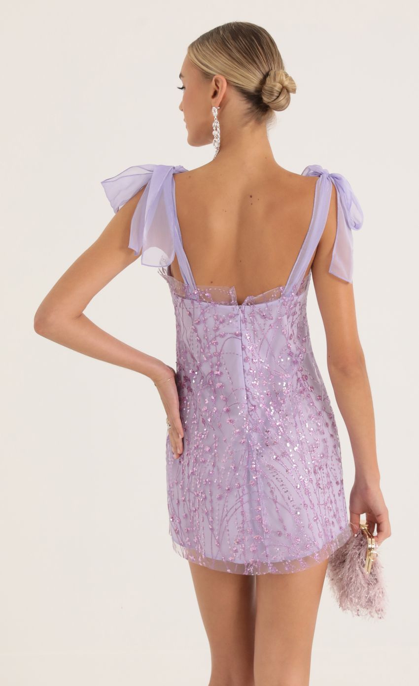 Picture Tulle Sequin Mini Dress in Purple. Source: https://media-img.lucyinthesky.com/data/Oct22/850xAUTO/f6d6c838-5f73-4095-8b08-8e22242aa2fa.jpg