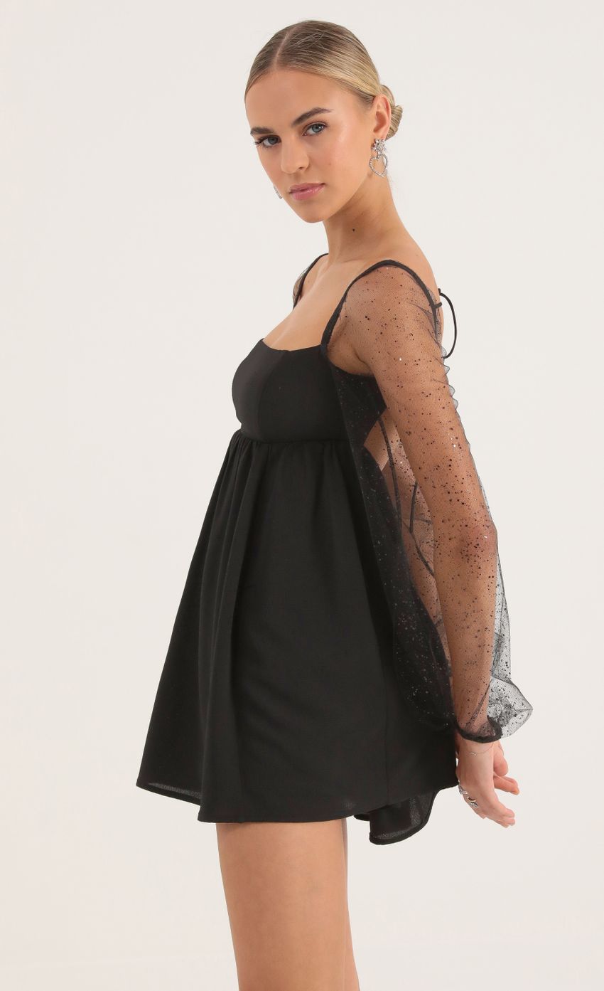 Picture Glitter Long Sleeve Baby Doll Dress in Black. Source: https://media-img.lucyinthesky.com/data/Oct22/850xAUTO/fb3f3070-ba4b-4fa2-bdaa-45f6014bb4ae.jpg
