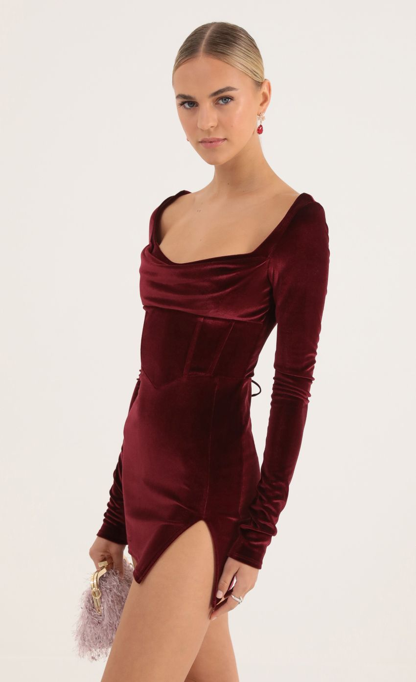 Picture Velvet Long Sleeve Corset Dress in Red. Source: https://media-img.lucyinthesky.com/data/Oct22/850xAUTO/fb3fdbb3-53e8-483f-a24c-2ba7234d3e6b.jpg