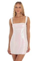 Picture Iridescent Sequin Dress in White. Source: https://media-img.lucyinthesky.com/data/Oct23/150xAUTO/fc3301be-caa2-4234-b1c1-3c010acf231d.jpg
