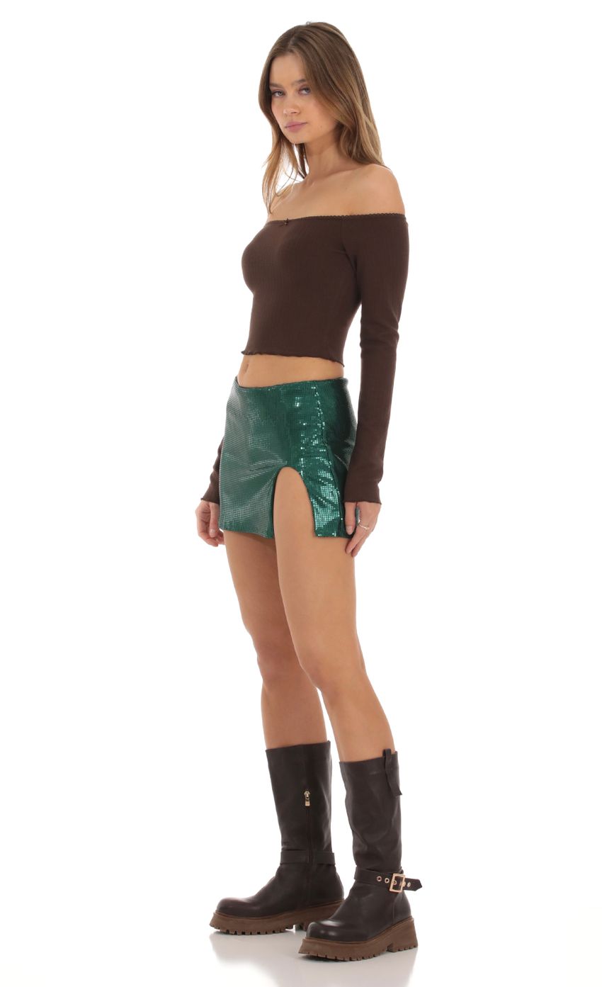 Picture Sequin Slit Skirt in Green. Source: https://media-img.lucyinthesky.com/data/Oct23/850xAUTO/0afd7648-4f47-4345-92f7-b5460fd323bb.jpg