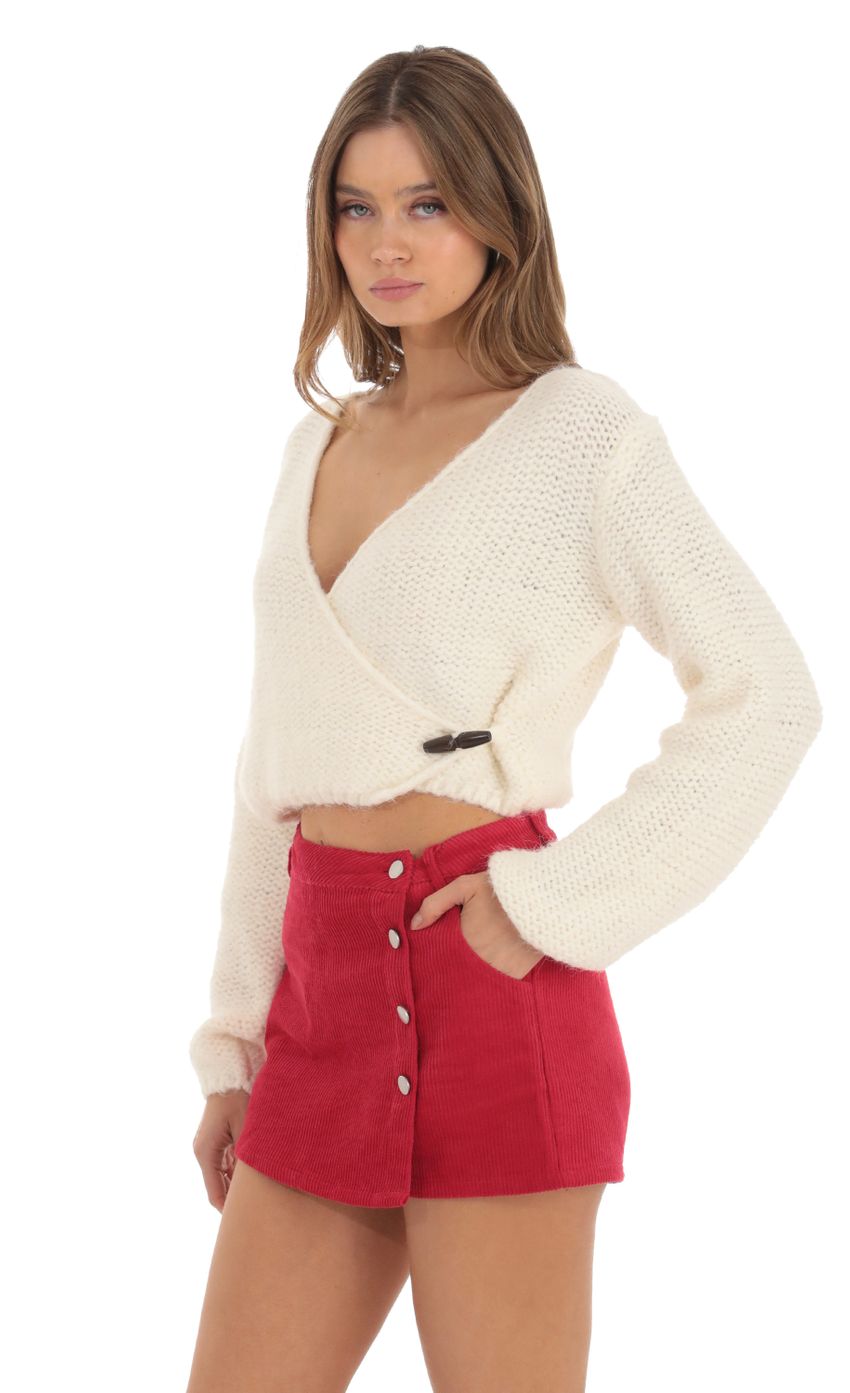 Picture Knit Wrap Jumper in Ivory. Source: https://media-img.lucyinthesky.com/data/Oct23/850xAUTO/16e1f75c-9c20-4a6c-999e-f006c1f4b58c.jpg