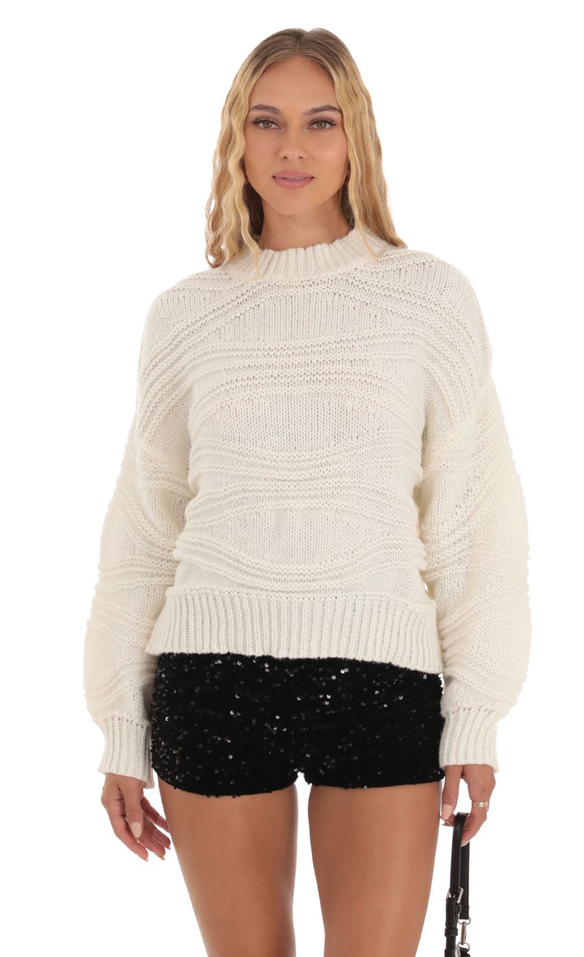 Picture Chunky Crochet Jumper in Ivory. Source: https://media-img.lucyinthesky.com/data/Oct23/850xAUTO/1a0b4aec-fe27-408a-a2e2-2d2473e1d49f.jpg
