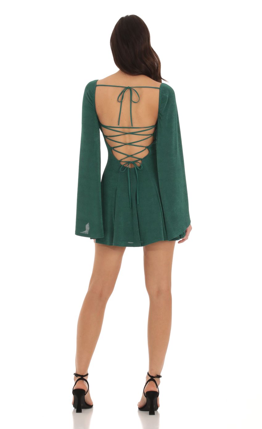 Picture Slinky Flare Sleeve Dress in Green. Source: https://media-img.lucyinthesky.com/data/Oct23/850xAUTO/1cf98727-b5b2-4ec7-b8f6-f4b40df7b736.jpg